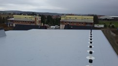 Izolace střech bytových domů ve Vochově z PVC fólie